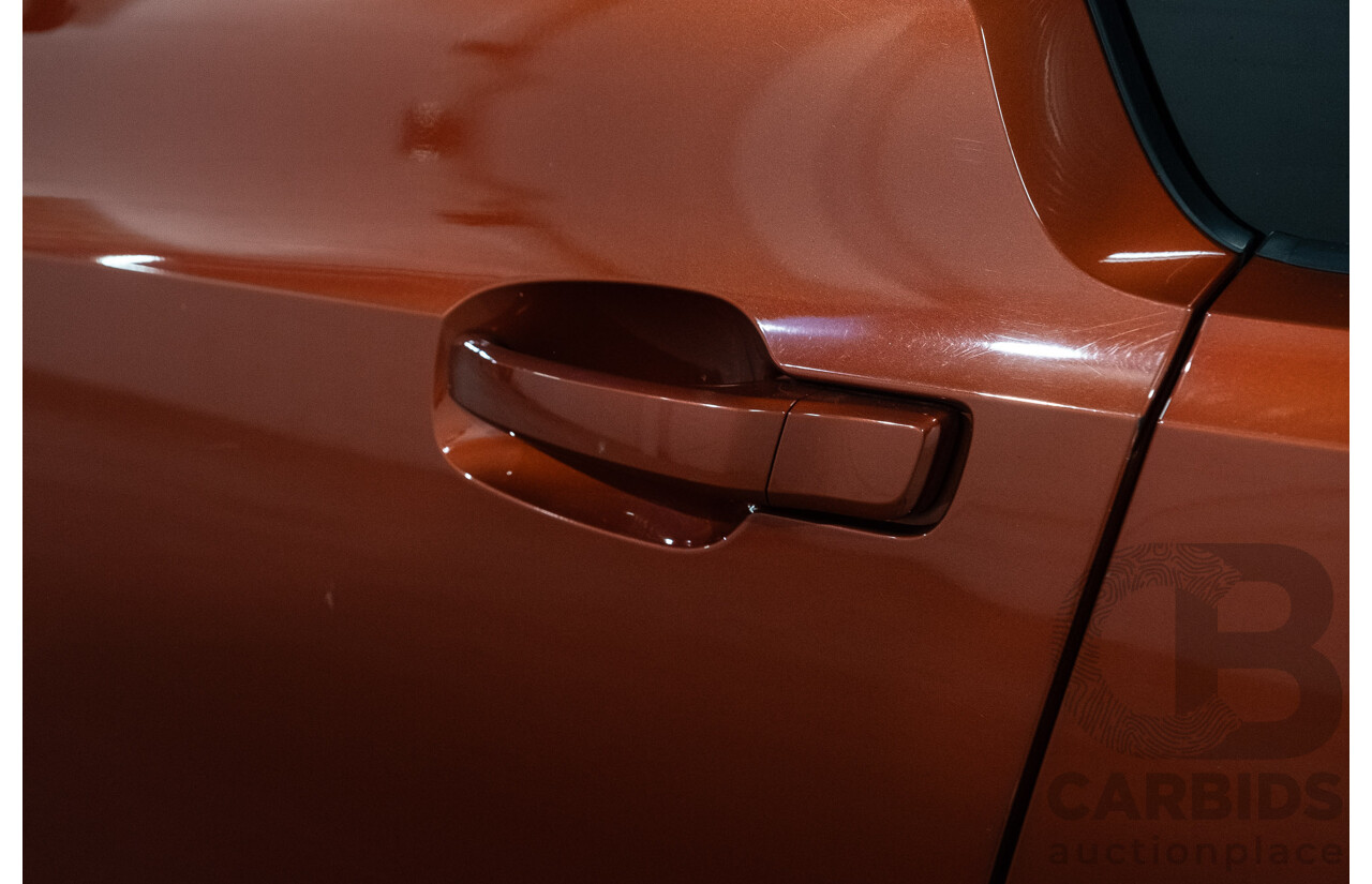 05/2015 BMW i3 REx Hybrid (RWD) IO1 4d Hatchback Solar Orange Metallic/Fluid Black 0.6L - 125kW