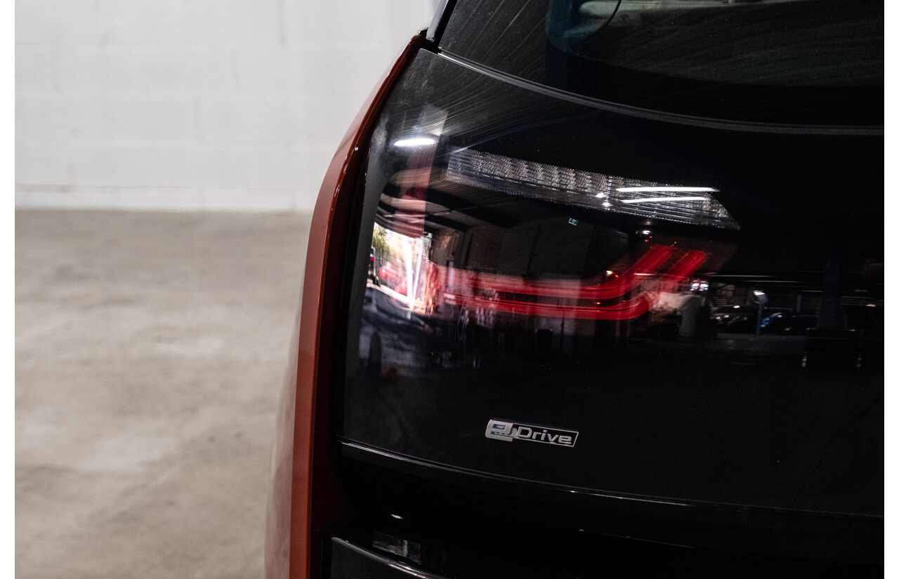 05/2015 BMW i3 REx Hybrid (RWD) IO1 4d Hatchback Solar Orange Metallic/Fluid Black 0.6L - 125kW