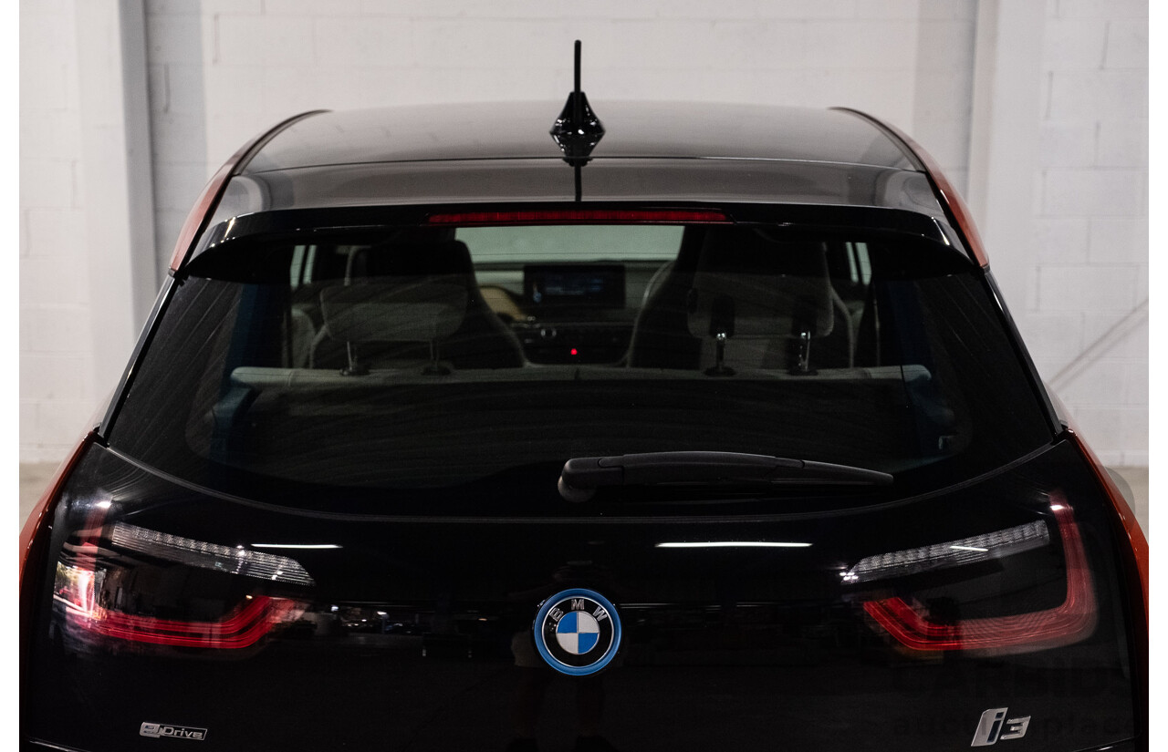 05/2015 BMW i3 REx Hybrid (RWD) IO1 4d Hatchback Solar Orange Metallic/Fluid Black 0.6L - 125kW