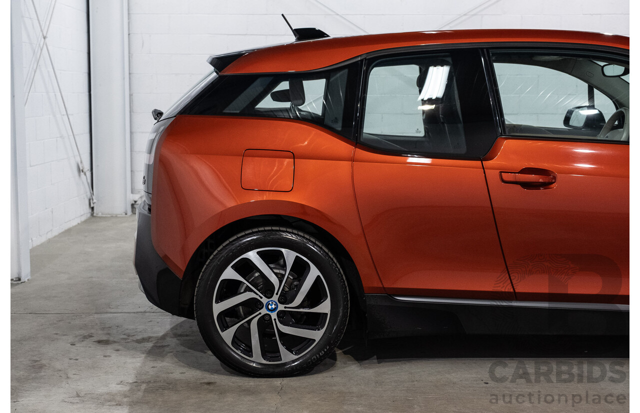 05/2015 BMW i3 REx Hybrid (RWD) IO1 4d Hatchback Solar Orange Metallic/Fluid Black 0.6L - 125kW