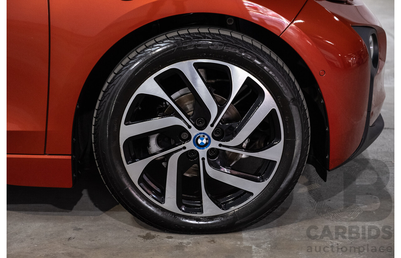 05/2015 BMW i3 REx Hybrid (RWD) IO1 4d Hatchback Solar Orange Metallic/Fluid Black 0.6L - 125kW