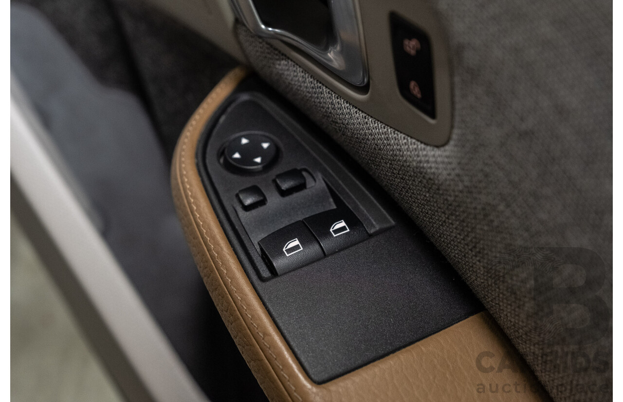 05/2015 BMW i3 REx Hybrid (RWD) IO1 4d Hatchback Solar Orange Metallic/Fluid Black 0.6L - 125kW