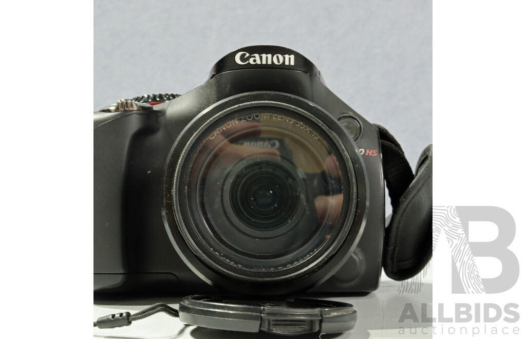 Canon Powershot SX40 HS Camera in Canon Soft Case with Praktica MTL3 Camera, Pentacon Lens in Carry Case
