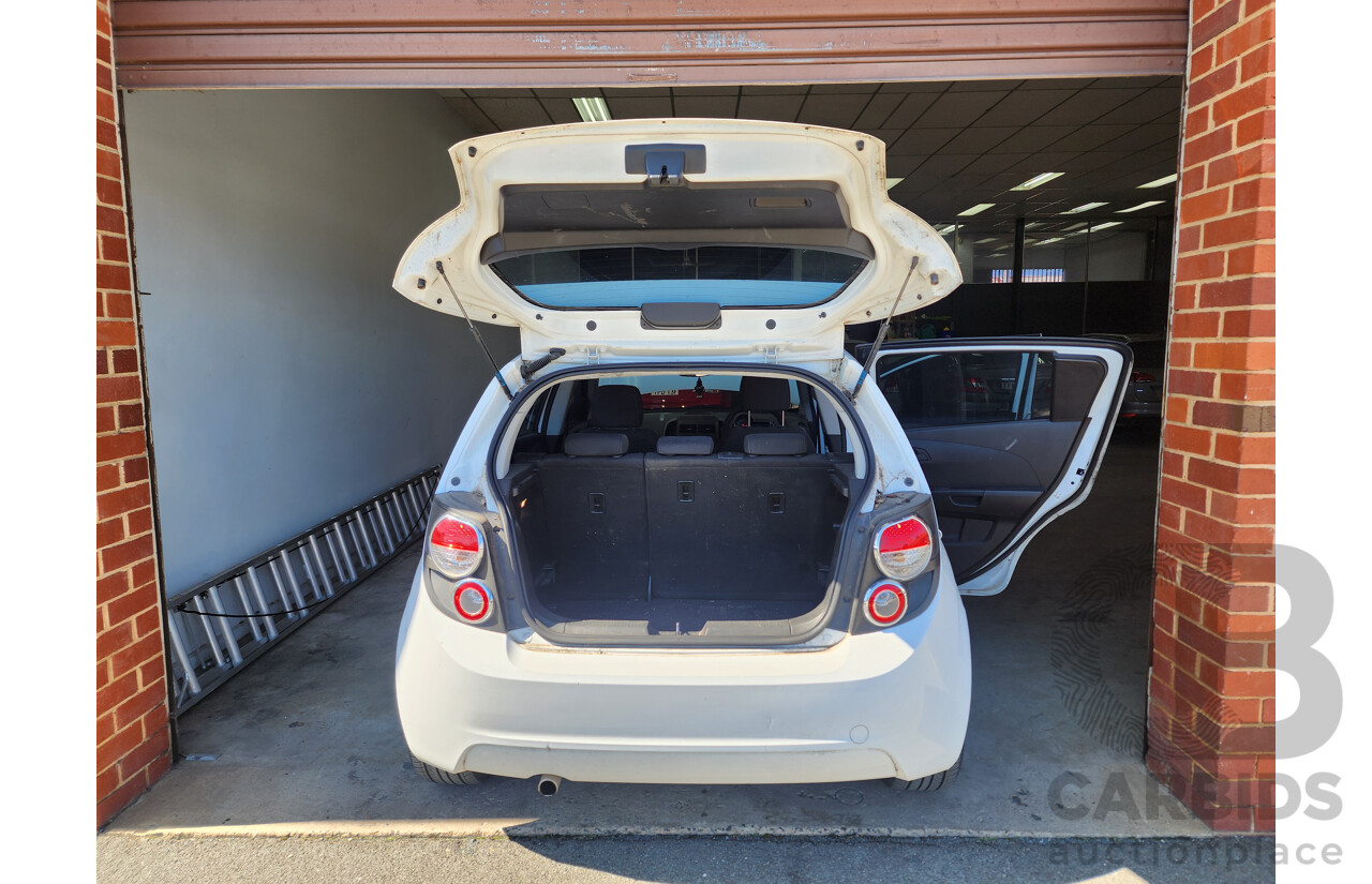11/2012 Holden Barina  TM 5d Hatchback White 1.6L