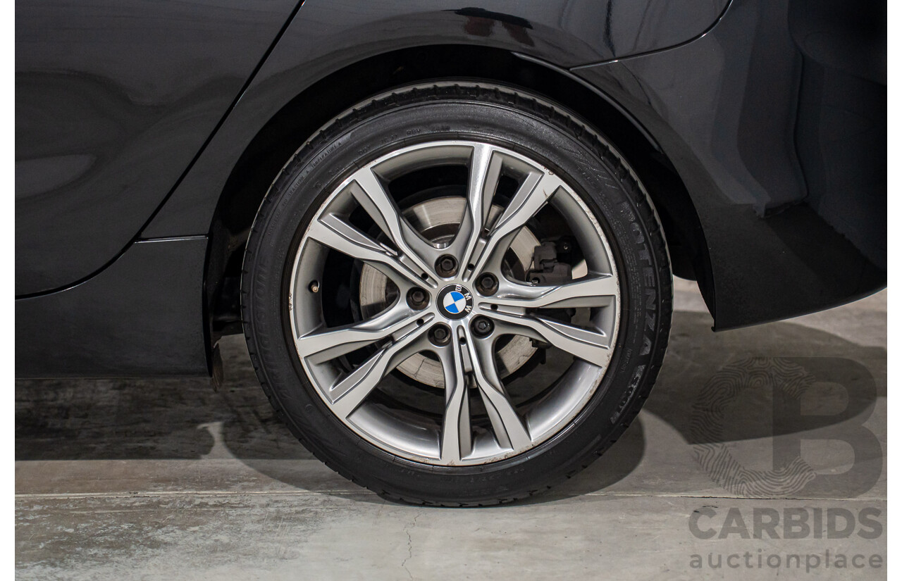 11/2014 BMW 225i Active Tourer Sport Line F45 4d Wagon Black Sapphire Metallic Turbo 2.0L