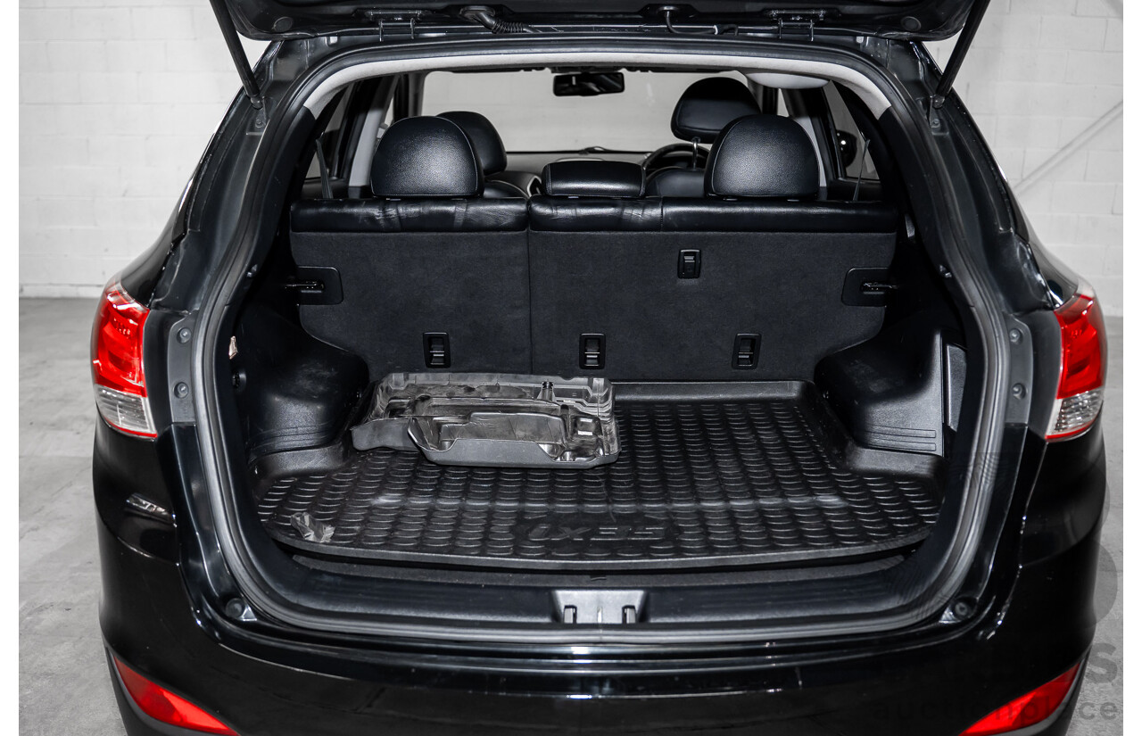 3/2011 Hyundai ix35 Highlander (AWD) LM MY11 4d Wagon Phantom Black Metallic Turbo Diesel 2.0L
