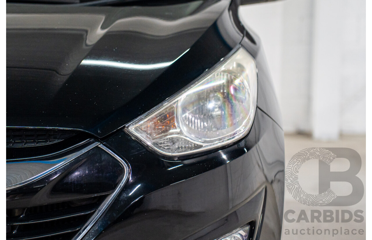 3/2011 Hyundai ix35 Highlander (AWD) LM MY11 4d Wagon Phantom Black Metallic Turbo Diesel 2.0L
