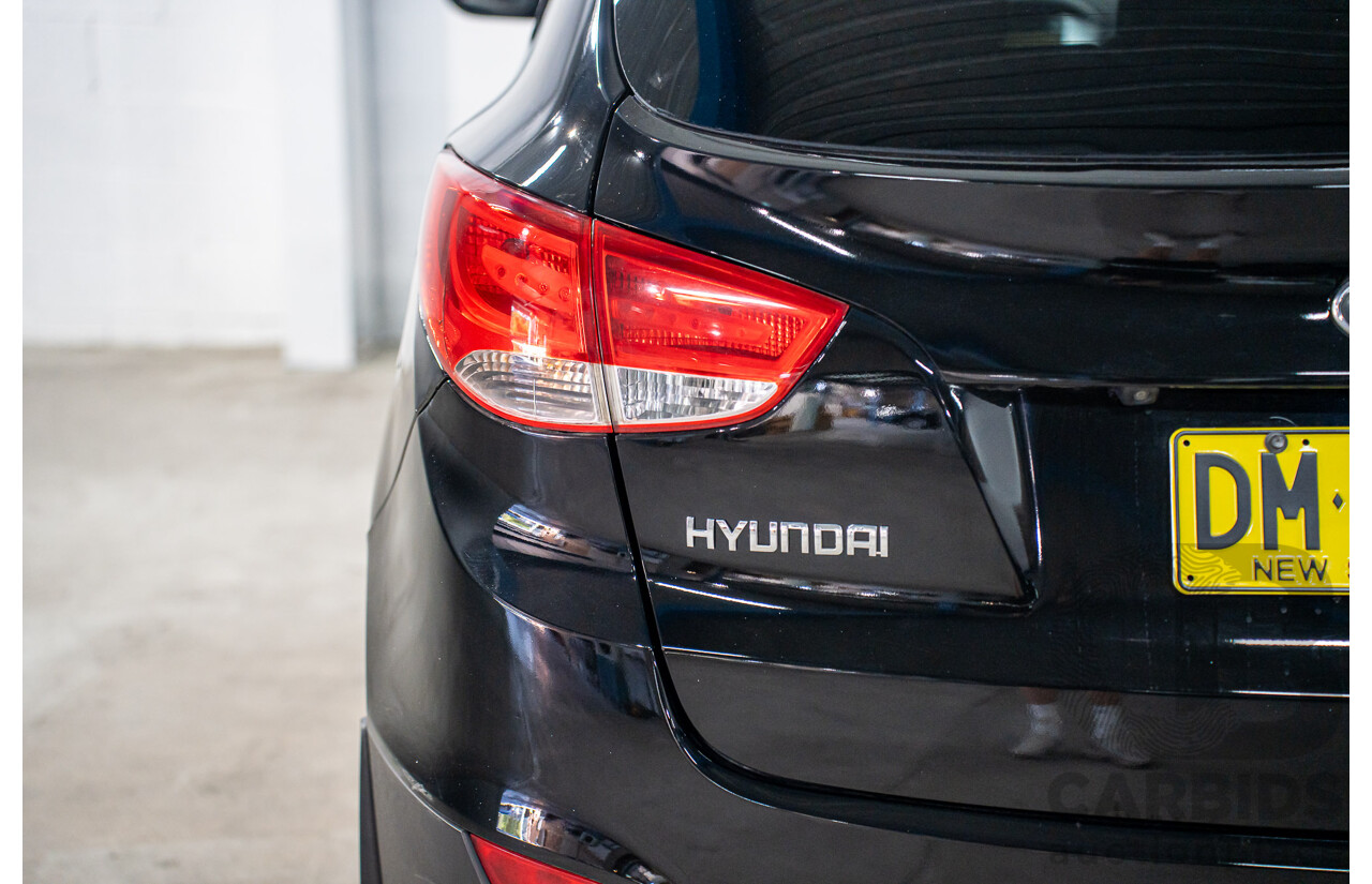 3/2011 Hyundai ix35 Highlander (AWD) LM MY11 4d Wagon Phantom Black Metallic Turbo Diesel 2.0L