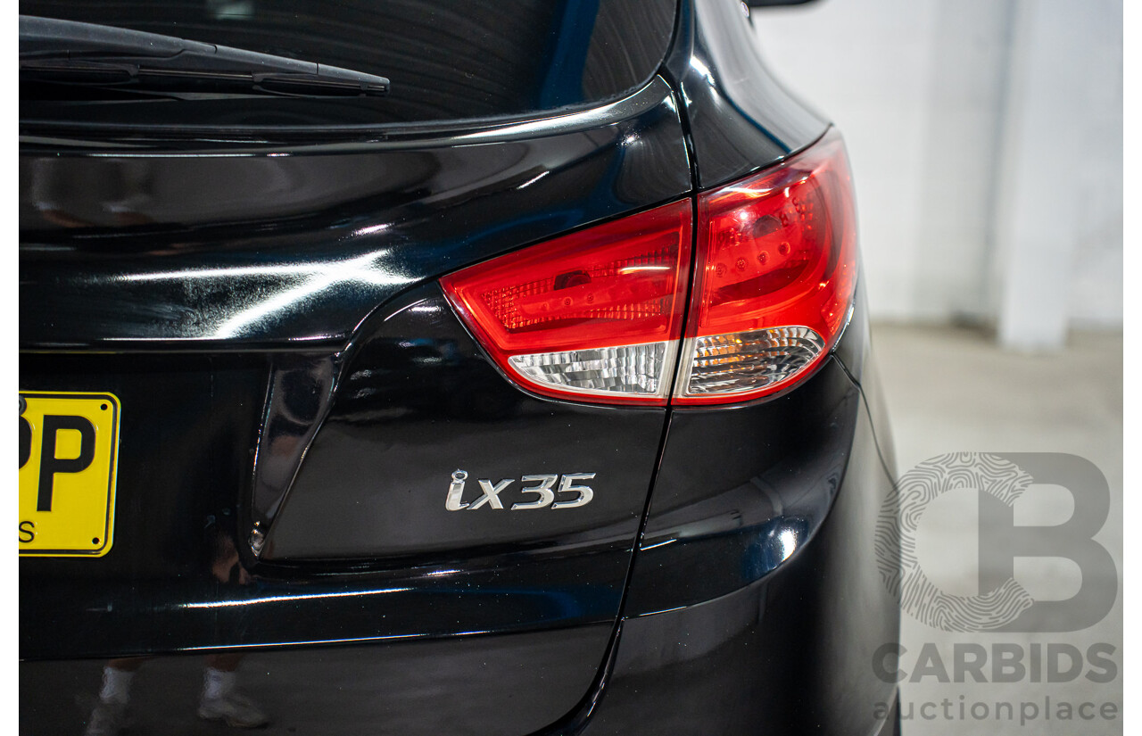 3/2011 Hyundai ix35 Highlander (AWD) LM MY11 4d Wagon Phantom Black Metallic Turbo Diesel 2.0L