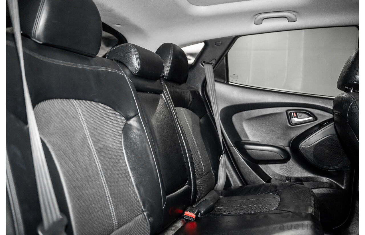 3/2011 Hyundai ix35 Highlander (AWD) LM MY11 4d Wagon Phantom Black Metallic Turbo Diesel 2.0L