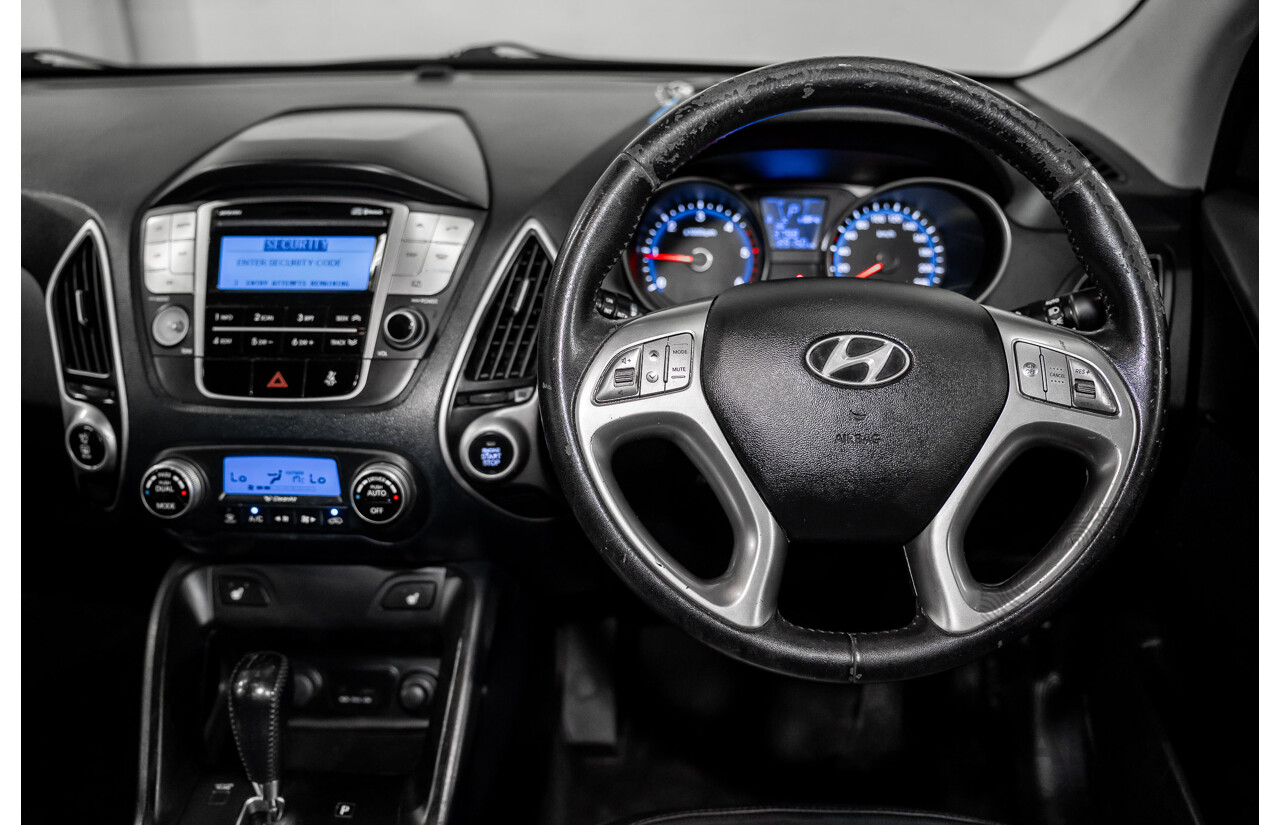 3/2011 Hyundai ix35 Highlander (AWD) LM MY11 4d Wagon Phantom Black Metallic Turbo Diesel 2.0L