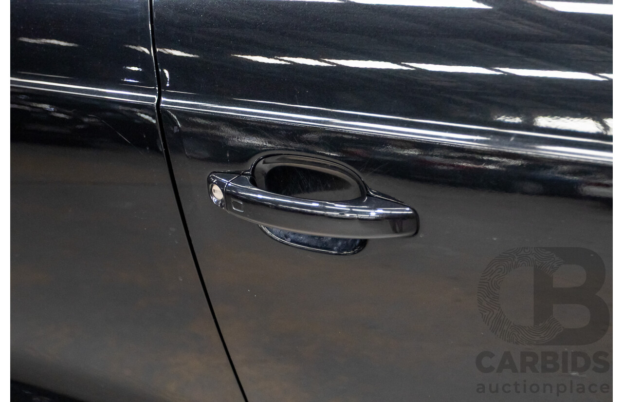 07/2014 Audi Q3 TFSI Quattro (AWD) 125kw 8U MY14 4d Wagon Phantom Black Pearl Turbo 2.0L