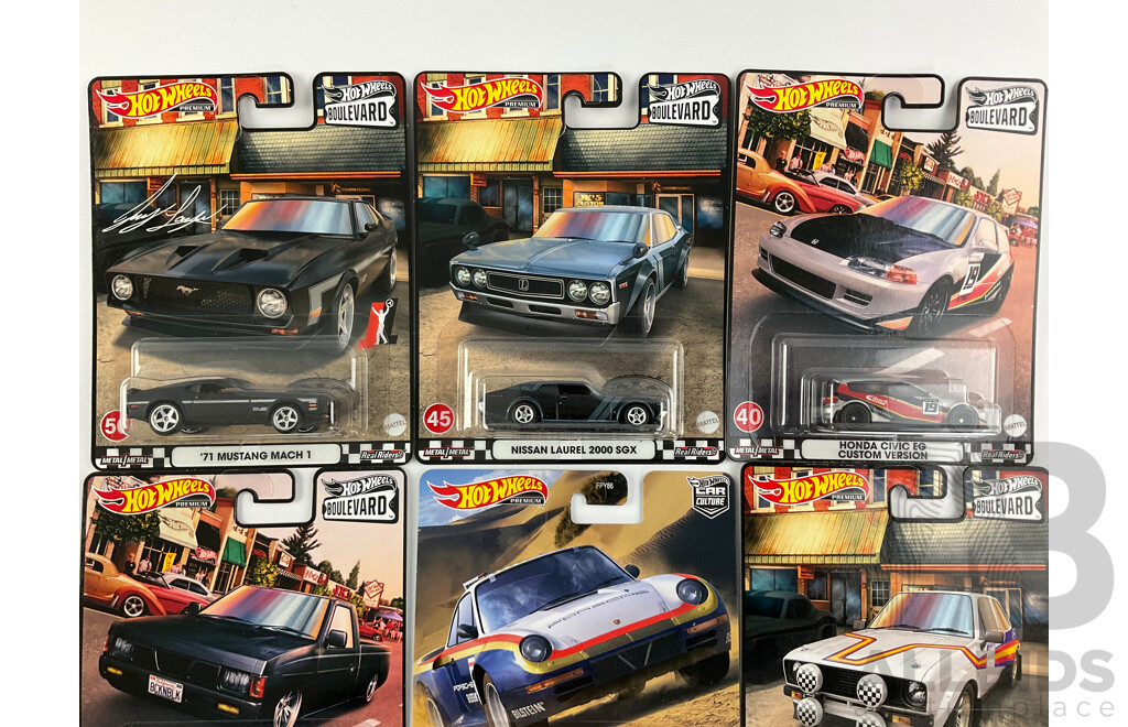 Nine Boxed Hot Wheels Vehicles Including Porsche, Ford, Datsun/Nissan, Honda