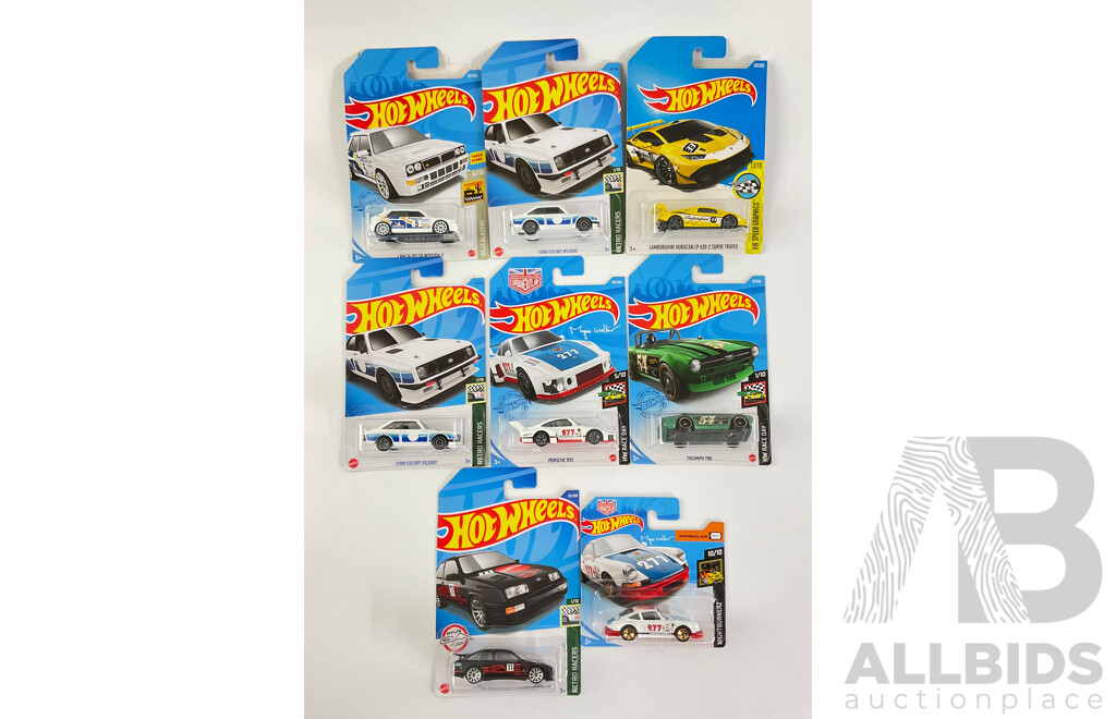 Eight Boxed Hot Wheels Vehicles Including Ford Sierra, Escort, Lancia Delta, Triumph TR6, Porshe 935/911