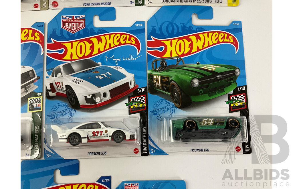 Eight Boxed Hot Wheels Vehicles Including Ford Sierra, Escort, Lancia Delta, Triumph TR6, Porshe 935/911