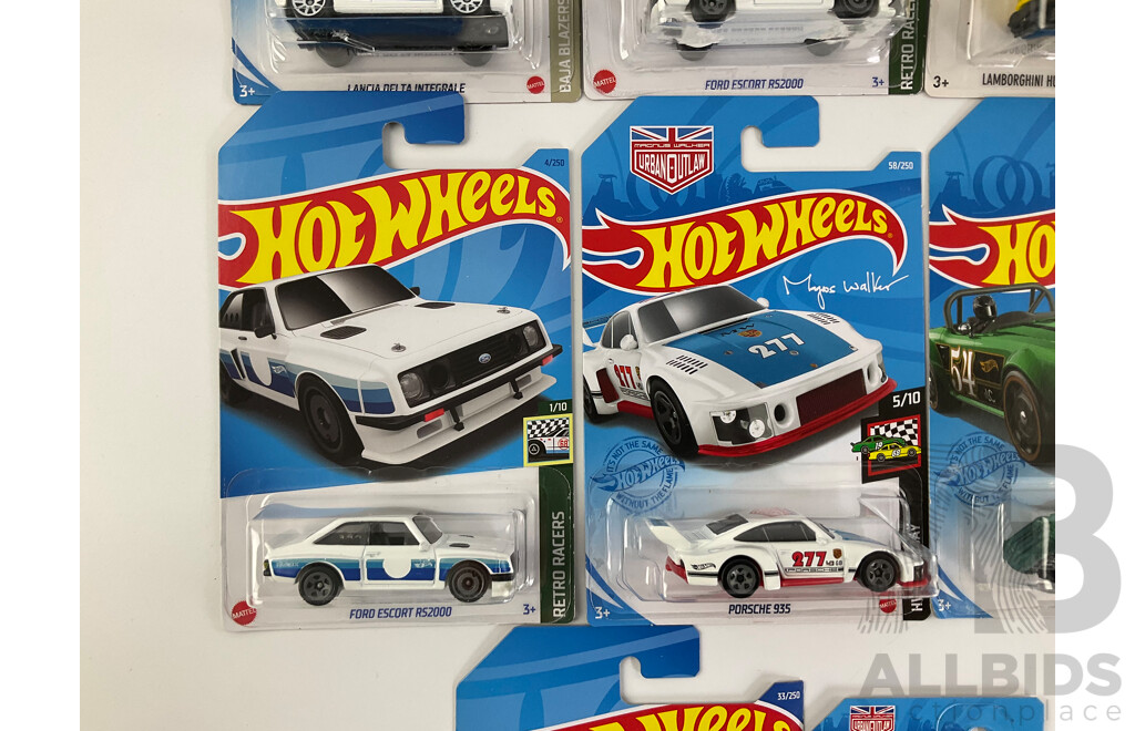 Eight Boxed Hot Wheels Vehicles Including Ford Sierra, Escort, Lancia Delta, Triumph TR6, Porshe 935/911