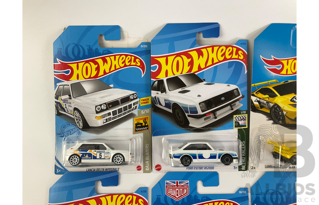 Eight Boxed Hot Wheels Vehicles Including Ford Sierra, Escort, Lancia Delta, Triumph TR6, Porshe 935/911