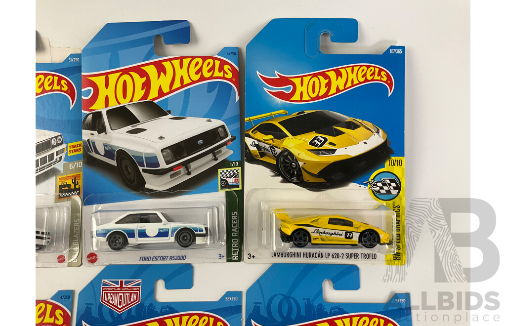 Eight Boxed Hot Wheels Vehicles Including Ford Sierra, Escort, Lancia Delta, Triumph TR6, Porshe 935/911