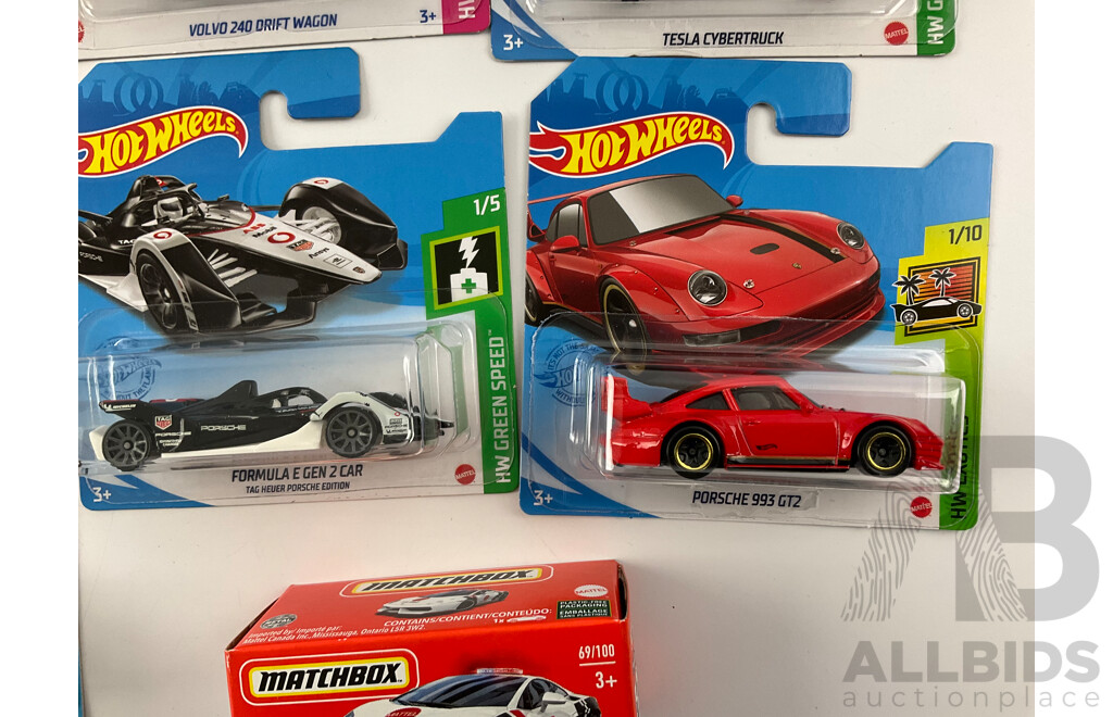 Six Boxed Hot Wheels Vehicles Including Porsche, Aston Martin, Volvo with Boxed Matchbox Lamborghini