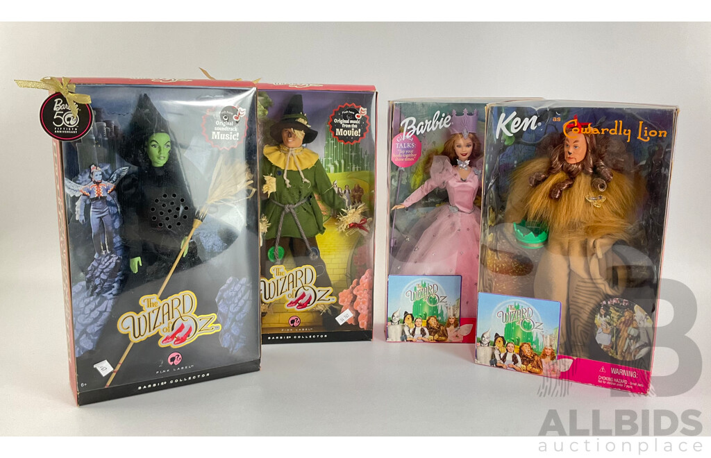 Four Boxed Barbie Wizard of Oz Dolls Including Wicked Witch of the West, Cowardly Lion, Scarecrow, Glinda