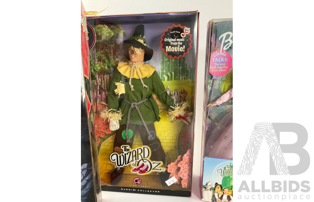 Four Boxed Barbie Wizard of Oz Dolls Including Wicked Witch of the West, Cowardly Lion, Scarecrow, Glinda