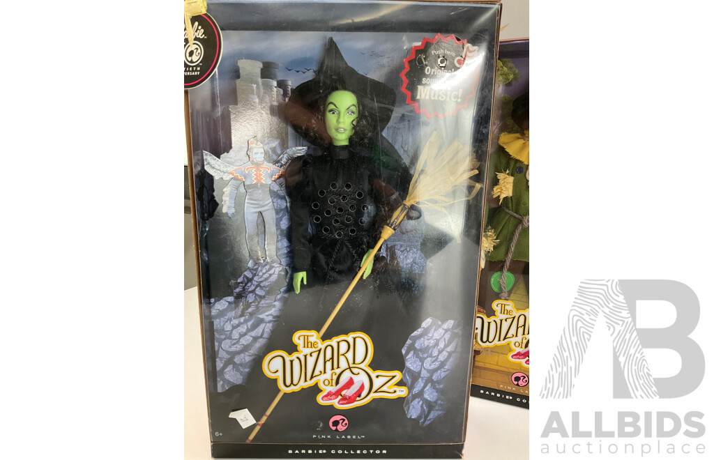 Four Boxed Barbie Wizard of Oz Dolls Including Wicked Witch of the West, Cowardly Lion, Scarecrow, Glinda
