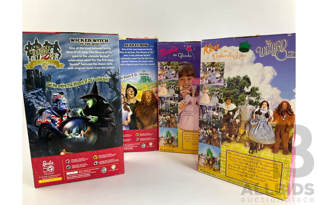 Four Boxed Barbie Wizard of Oz Dolls Including Wicked Witch of the West, Cowardly Lion, Scarecrow, Glinda