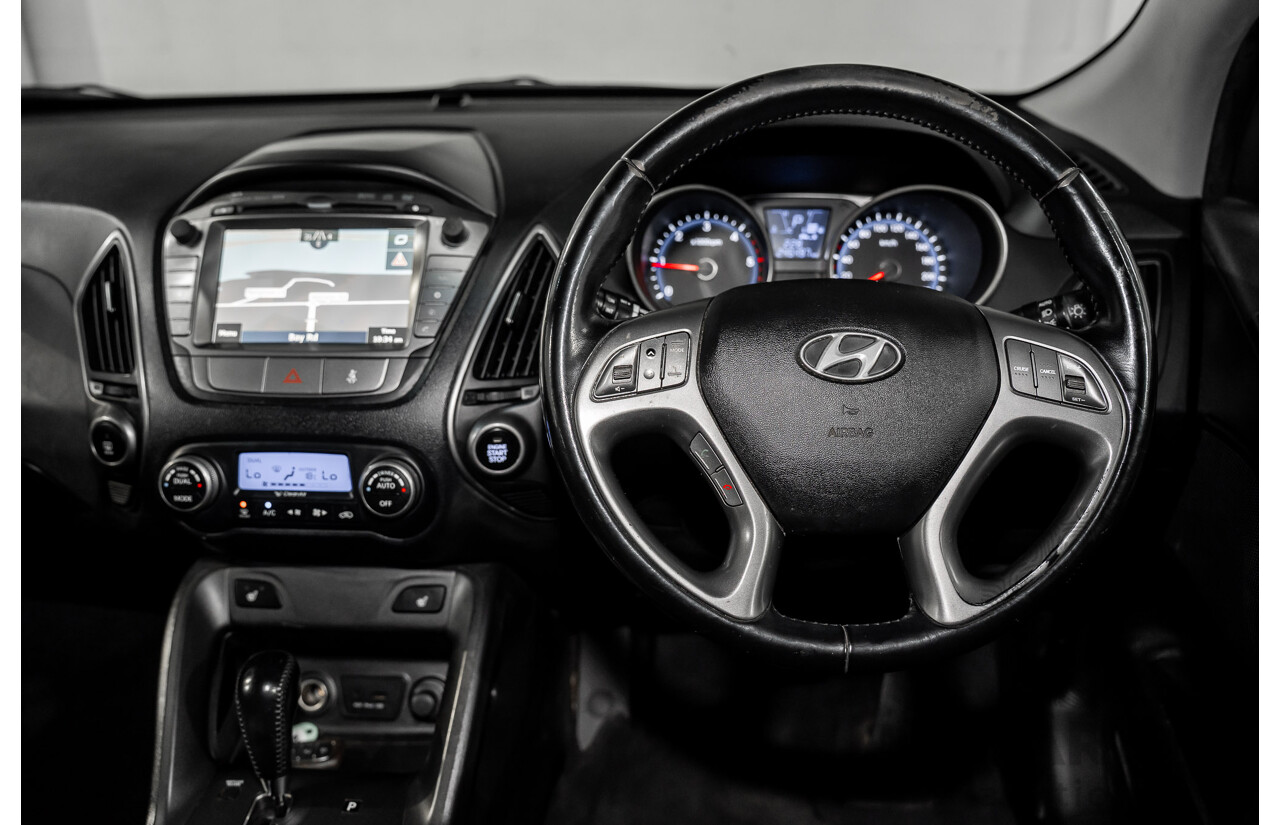 9/2014 Hyundai ix35 Highlander (AWD) LM Series II 4d Wagon Grey Titanium Metallic Turbo Diesel 2.0L