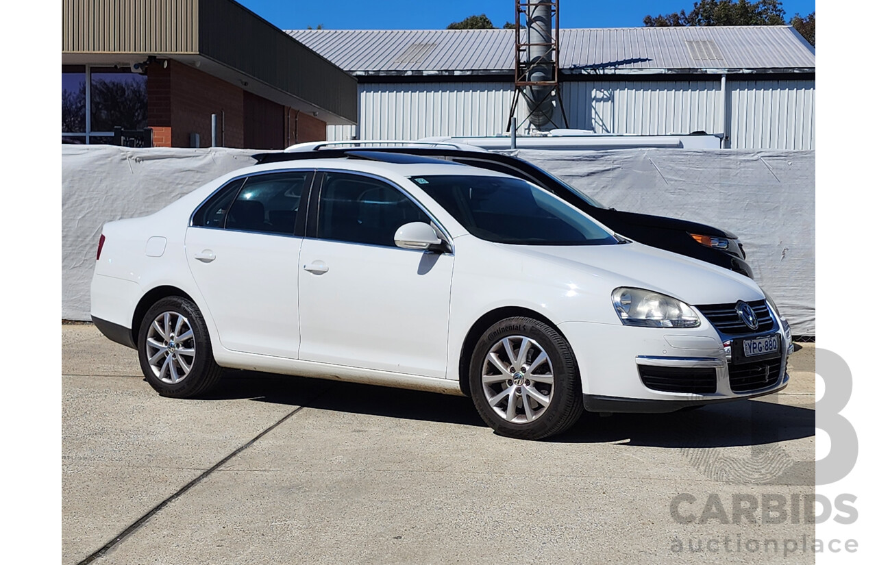 1/2010 Volkswagen Jetta 118 TSI 1KM MY10 4d Sedan White 1.4L