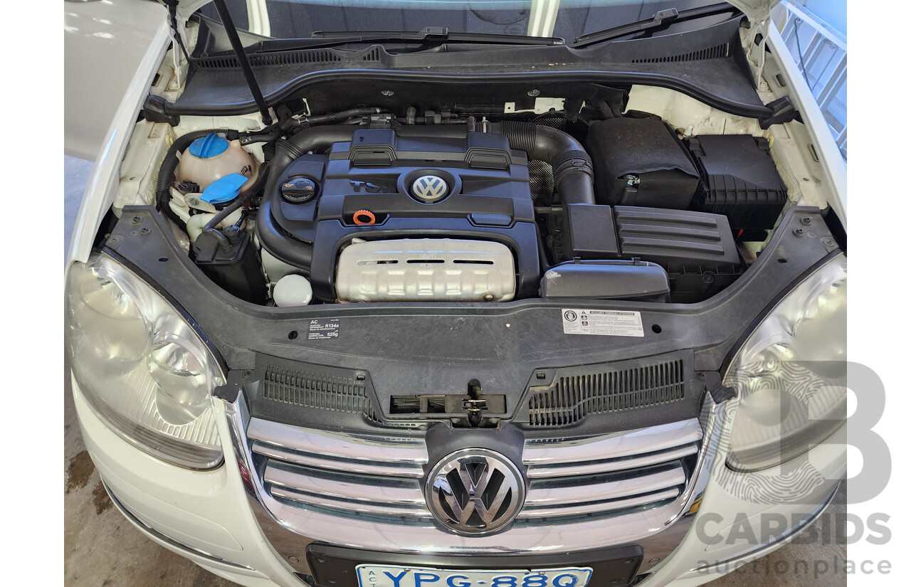 1/2010 Volkswagen Jetta 118 TSI 1KM MY10 4d Sedan White 1.4L