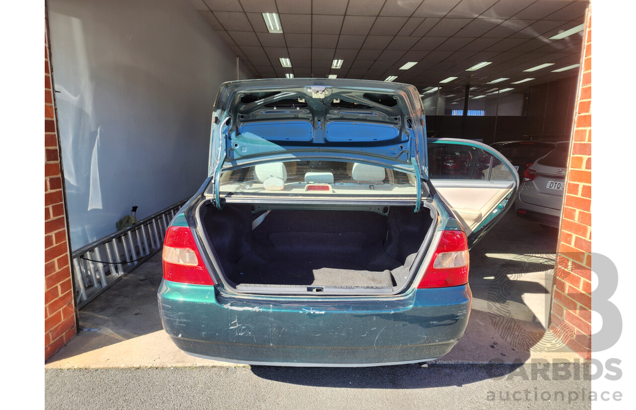3/2002 Toyota Corolla Ascent ZZE122R 4d Sedan Green 1.8L
