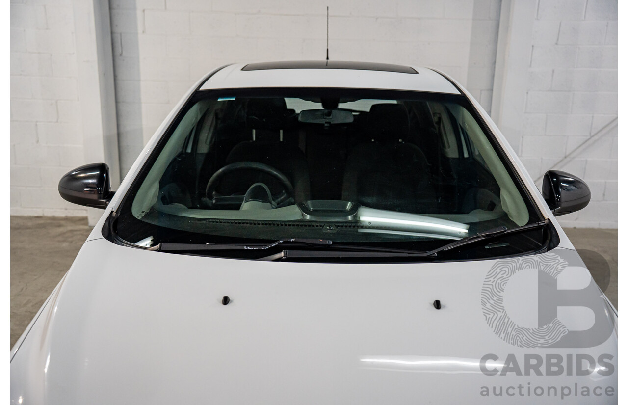 11/2015 Holden Barina X (FWD) TM MY16 5d Hatchback Summit White 1.6L