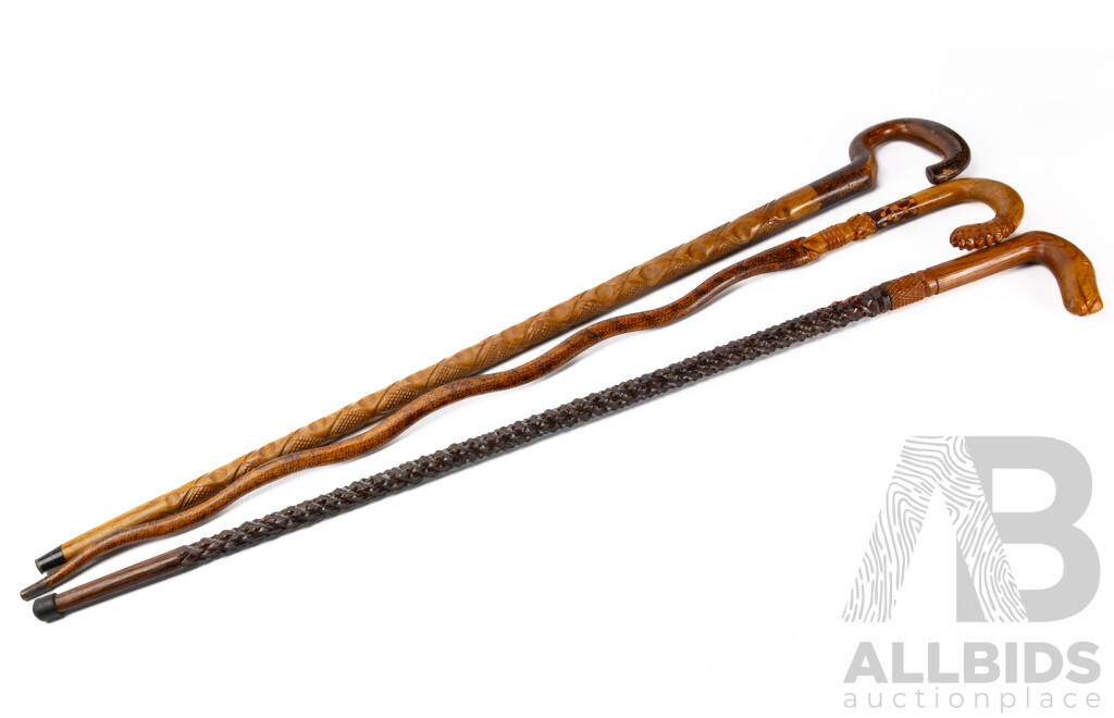 Trio of Indonesian Hand Decorated Wooden Walking Sticks