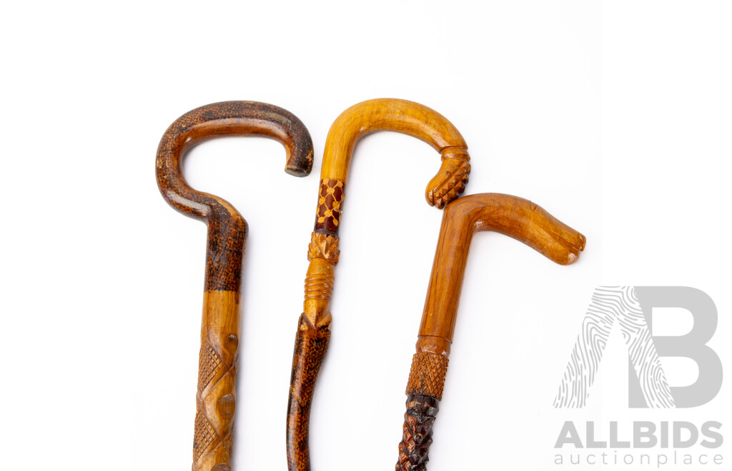 Trio of Indonesian Hand Decorated Wooden Walking Sticks