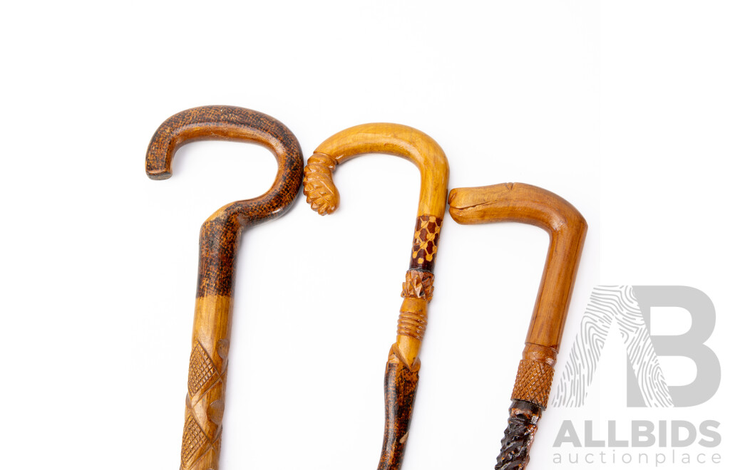 Trio of Indonesian Hand Decorated Wooden Walking Sticks
