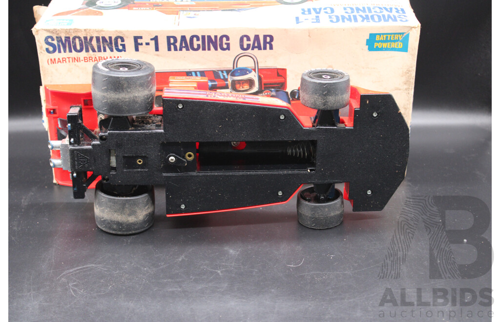 Smoking F-1 Racing Car