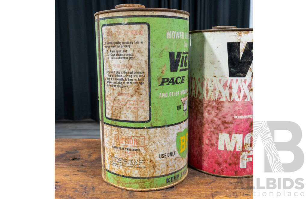 Pair of Vintage Victa Two Strike Tins and BP Example