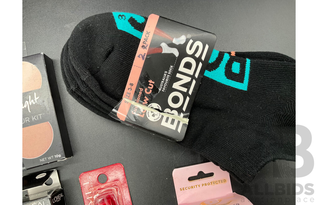 Assorted Cosmetics Including L'OREAL, RIMMEL, MAYBELLINE, REVLON and BONDS Socks - Lot of 9