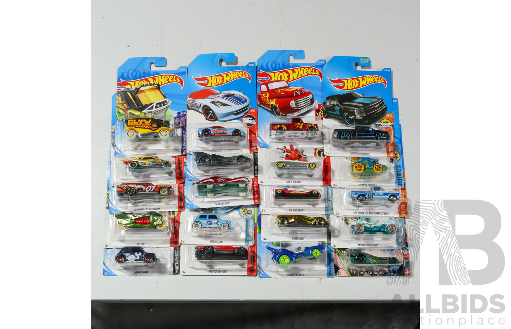 Twenty Boxed Hot Wheels Vehicles Including HW Hot Trucks, Nightburnerz, Super Chromes, HW Dare Devils