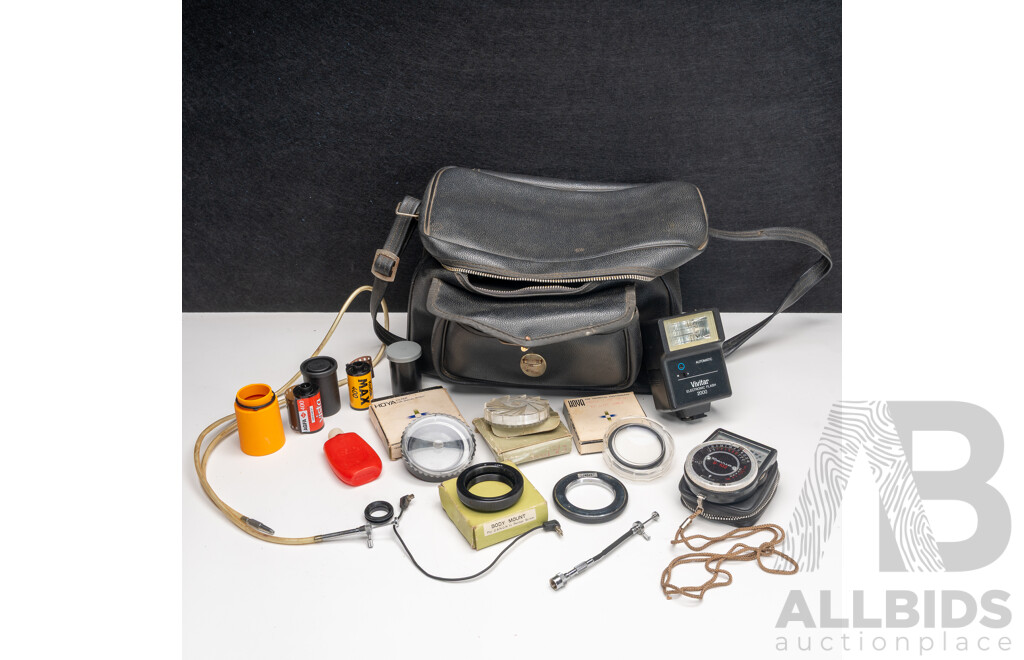 Canon F-1 Camera Kit with Multiple Lenses, Flash, Light Meter and Accessories