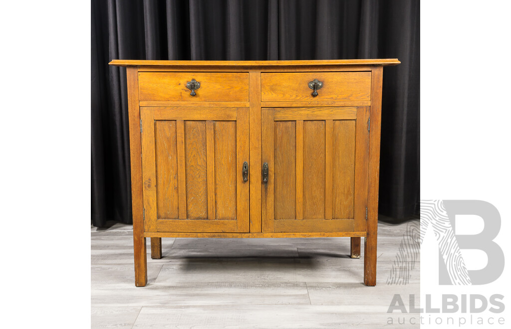 Elevated Oak Two Door Cabinet with Two Drawers