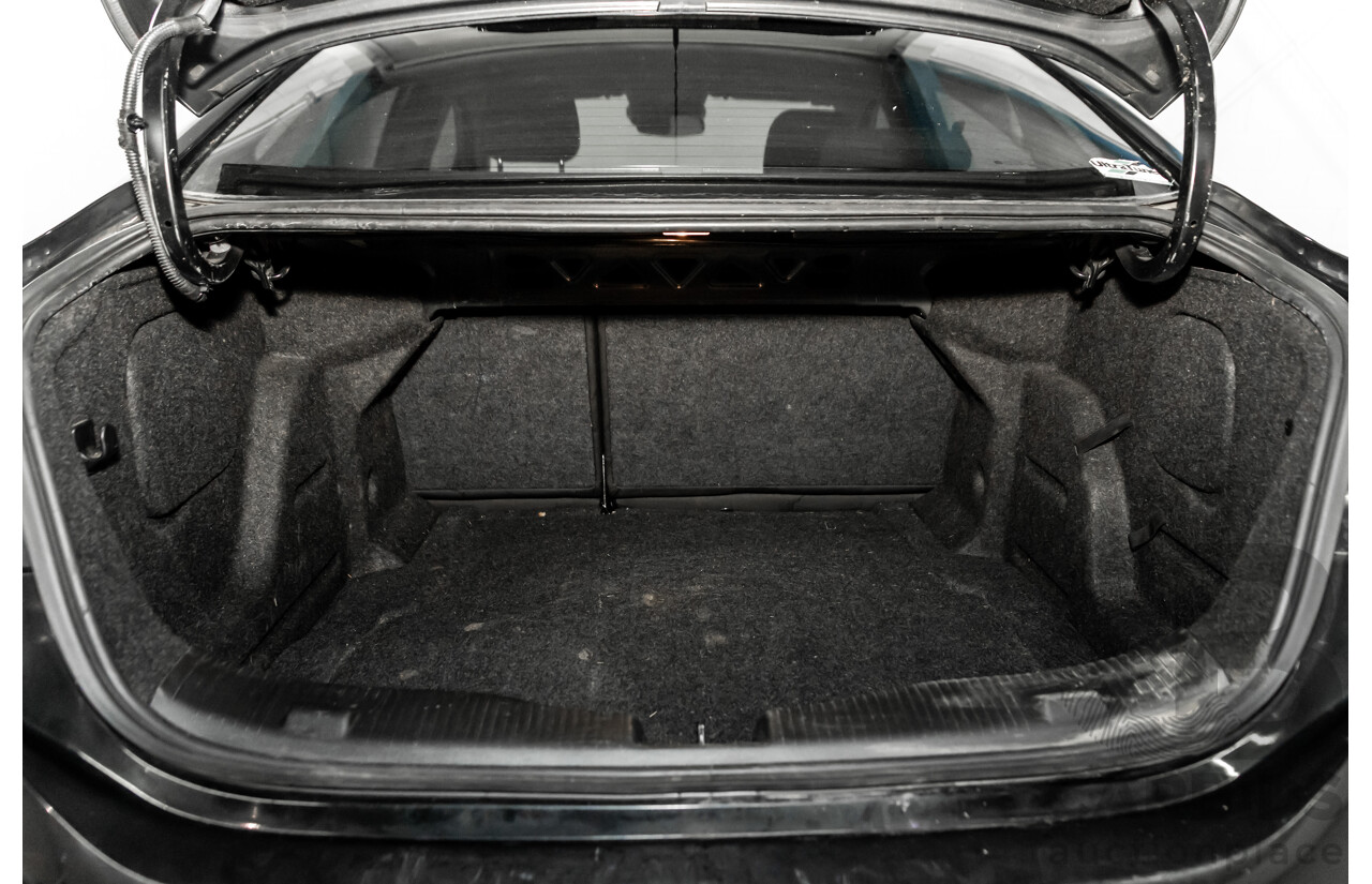 06/2017 Holden Astra LS Plus (FWD) BL MY17 4d Sedan Mineral Black Turbo 1.4L