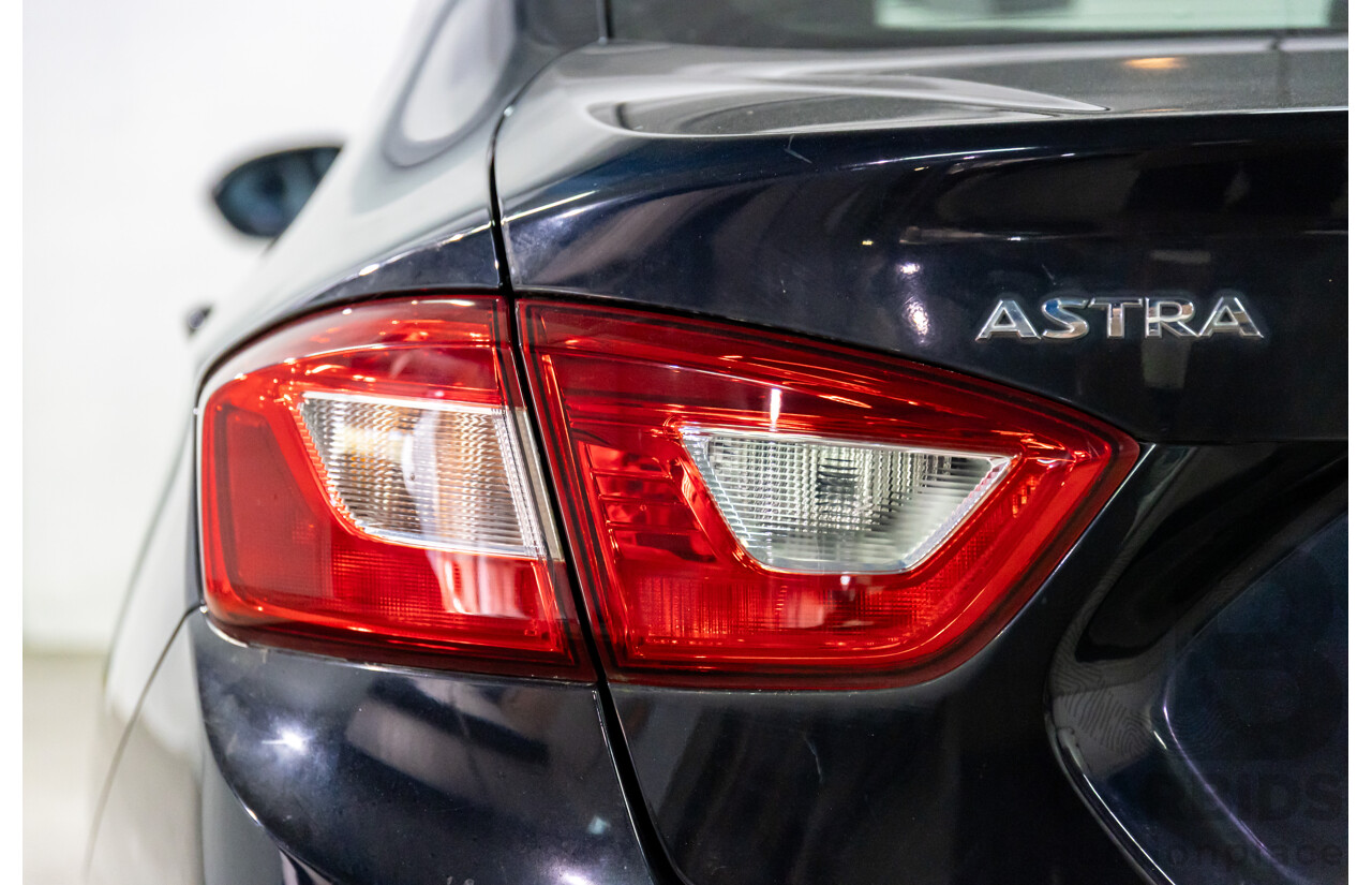06/2017 Holden Astra LS Plus (FWD) BL MY17 4d Sedan Mineral Black Turbo 1.4L
