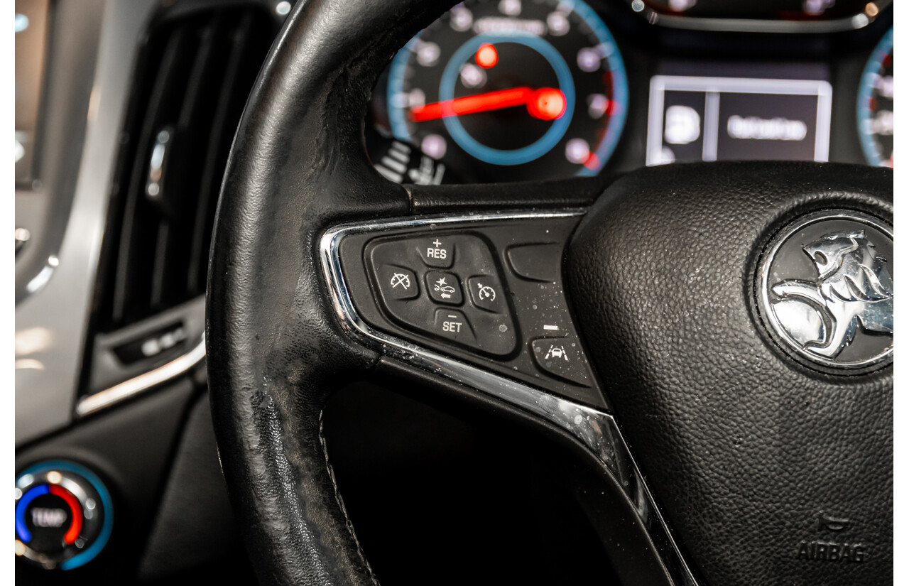 06/2017 Holden Astra LS Plus (FWD) BL MY17 4d Sedan Mineral Black Turbo 1.4L