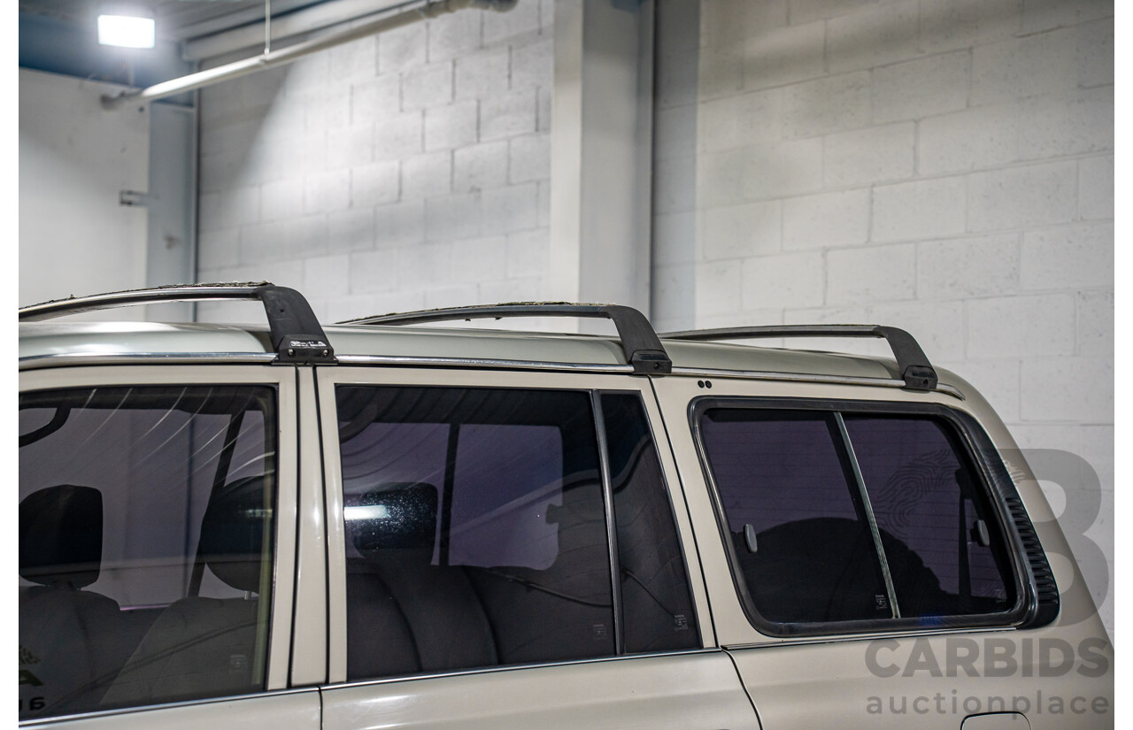 12/1995 Toyota Landcruiser GXL (4x4)  4d Wagon Golden Wheat Metallic Turbo V8 4.5L