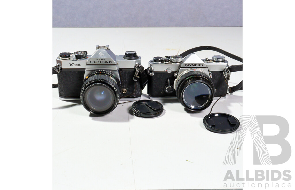 Asahi Pentax K100 Camera in Soft Case, Olympus OM 1 Camera in Soft Case and Espio 105G Digital Camera