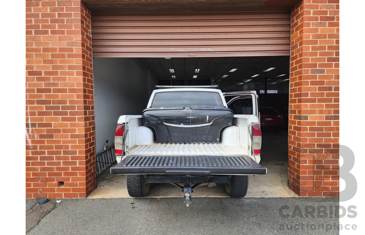 12/2011 Nissan Navara ST-R (4x4) D22 SERIES 5 Dual Cab P/Up White 2.5L