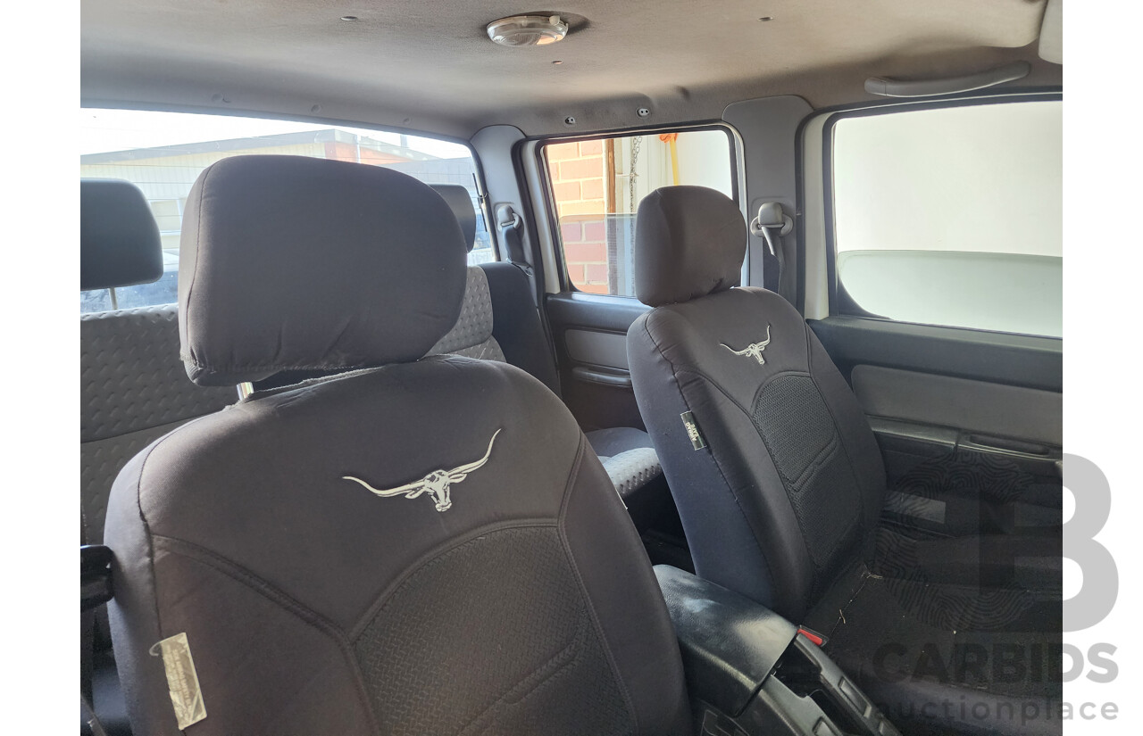 12/2011 Nissan Navara ST-R (4x4) D22 SERIES 5 Dual Cab P/Up White 2.5L