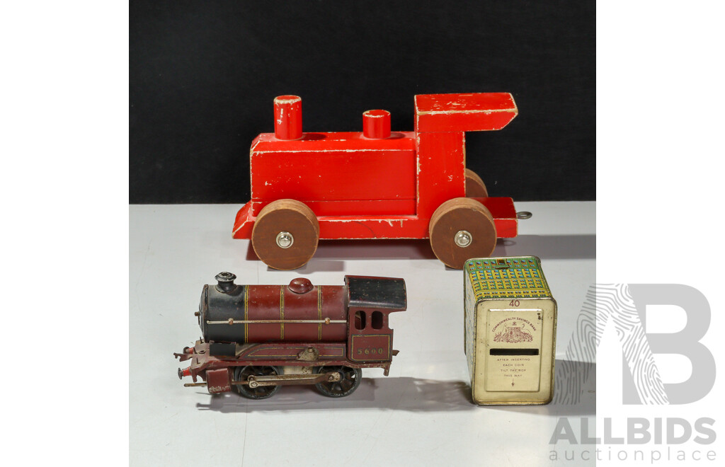 Vintage Hornby OO Gauge Clockwork Steam Locomotive, Timber Toy Steam Locomotive and Vintage Commonwealth Bank Money Tin