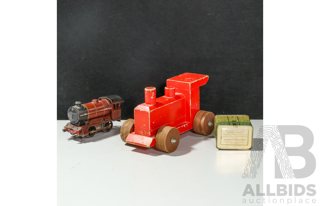 Vintage Hornby OO Gauge Clockwork Steam Locomotive, Timber Toy Steam Locomotive and Vintage Commonwealth Bank Money Tin